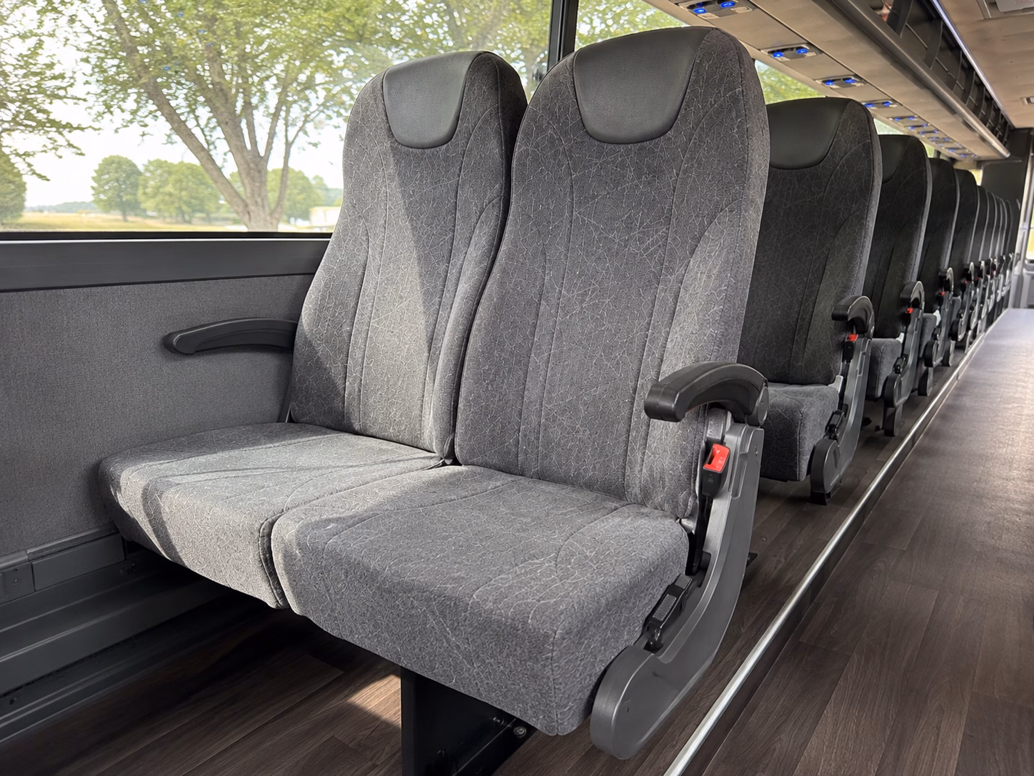 how seasonality and peak times affect charter bus rates in novi michigan